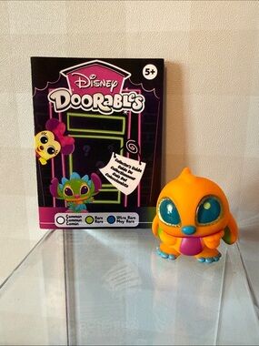 Disney Doorables Neon Orange Stitch Figure with Blue and Purple Accents